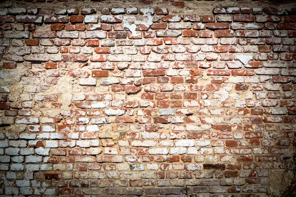 Кирпичная стена с винтажным видом — стоковое фото