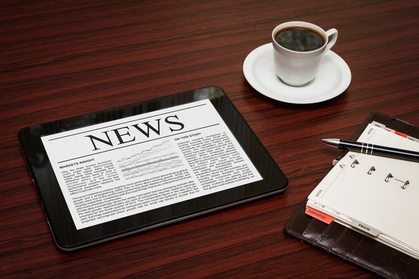 News on digital tablet. — Stock Photo, Image