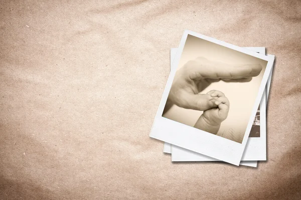 Fotolijsten op oude papier achtergrond. — Stockfoto