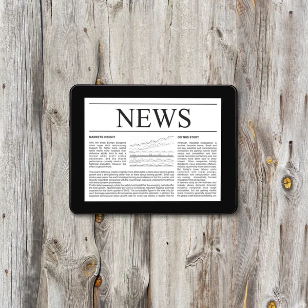 Tablet computer with business news — Stock Photo, Image