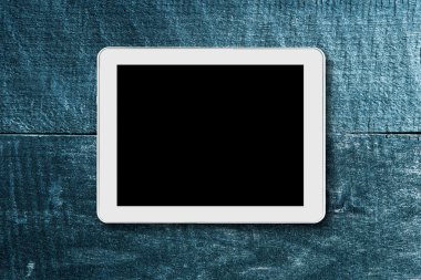 Tablet dokunmatik bilgisayar ahşap zemin.