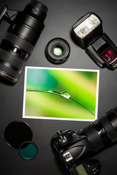 Camera lens and image on black background — Stock Photo, Image