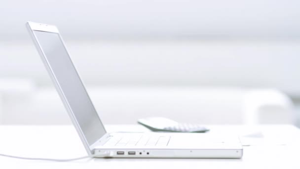 Businessman showing thumb up gesture in a front of laptop computer — Stock Video