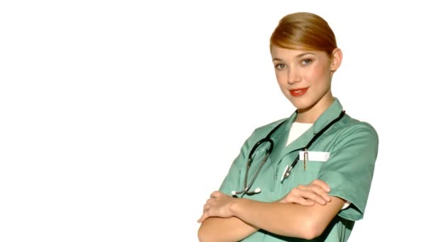20-25 anos de idade bonito médico feminino isolado no branco — Vídeo de Stock