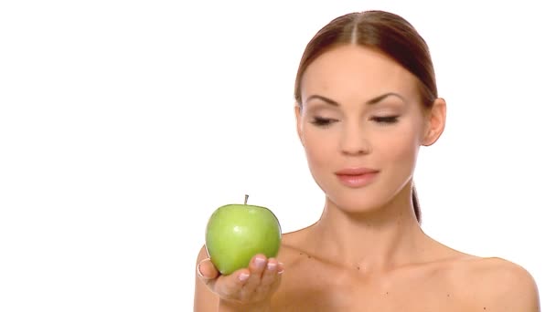 Portrait of beautiful and sexy woman, holding apple — Stock Video