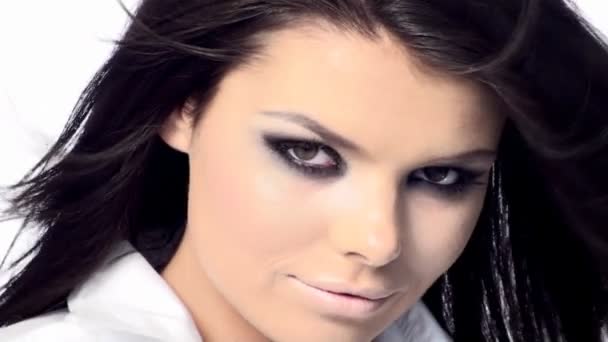 Young beautiful brunette with black scary makeup — Stock Video