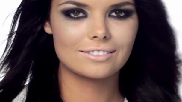 Young beautiful brunette with black scary makeup — Stock Video