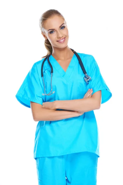 Young doctor holding her stethoscope around her neck — Stock Photo, Image