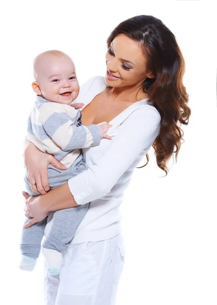 Jovem mãe com um bebê feliz — Fotografia de Stock