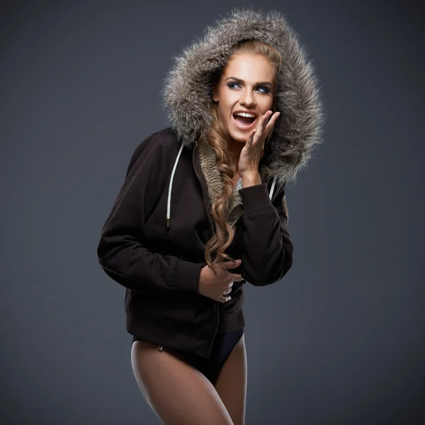 Beautiful woman in a fur trimmed hood — Stock Photo, Image