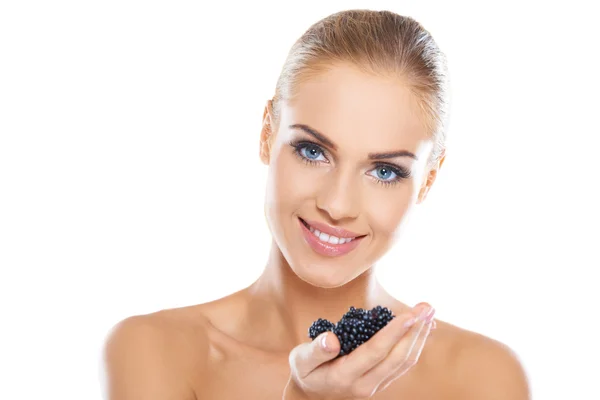 Smiling healthy woman with blackberries — Stock Photo, Image