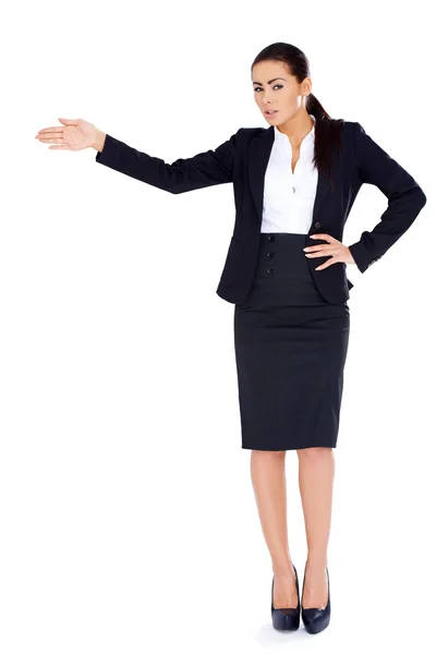 Business woman standing and pointing at copy space Royalty Free Stock Photos