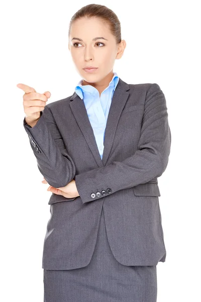 Businesswoman pointing and looking up — Stock Photo, Image