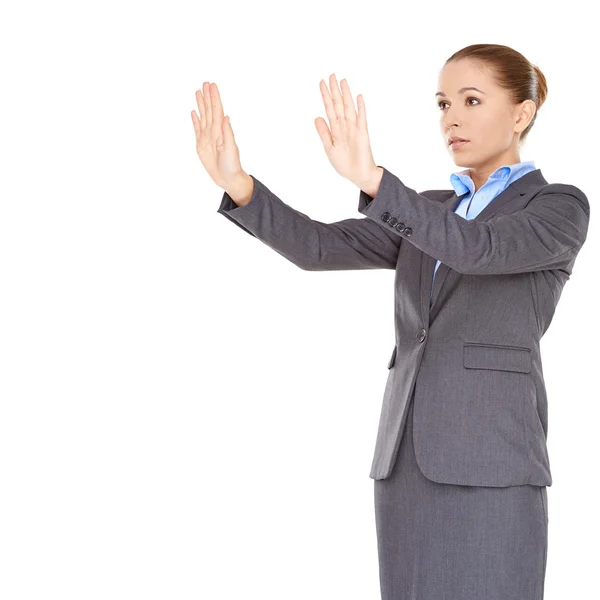 Businesswoman pointing and looking up — Stock Photo, Image