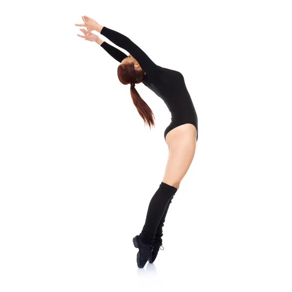 Woman standing en pointe arching backwards — Stock Photo, Image