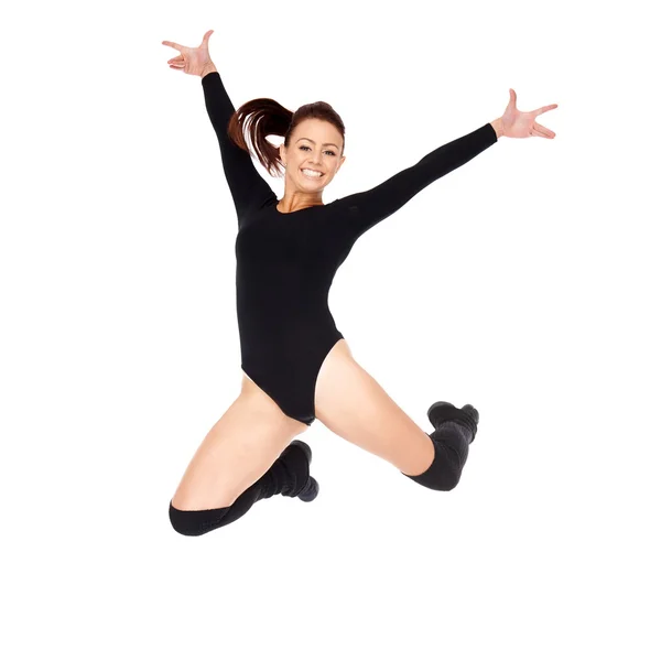 Agile woman leaping in the air — Stock Photo, Image