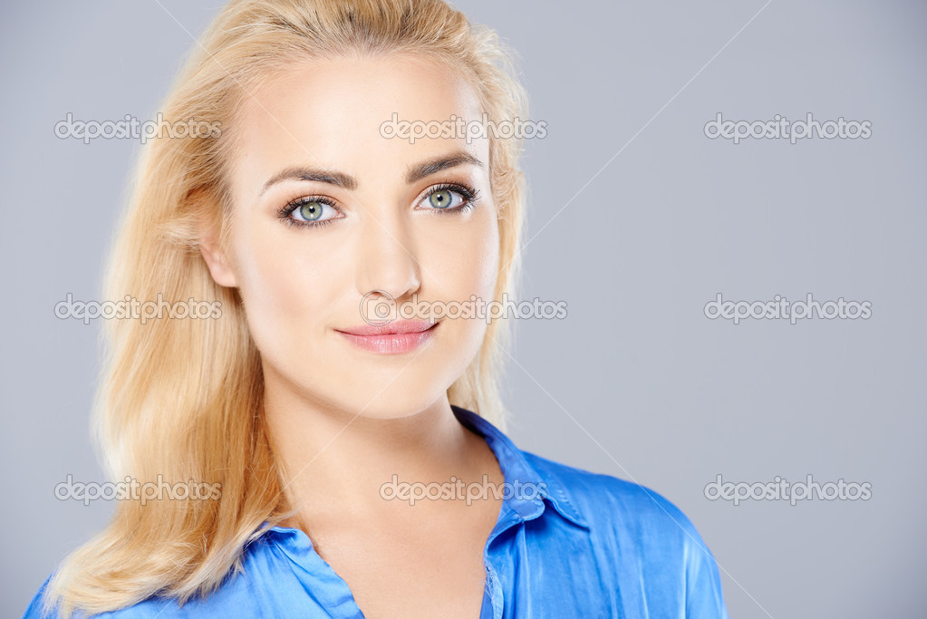 Beautiful woman with a serene smile Stock Photo by ©dashek 47367517