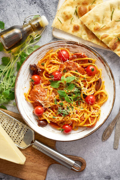 Tasty appetizing pasta served with tomato sauce Stock Photo