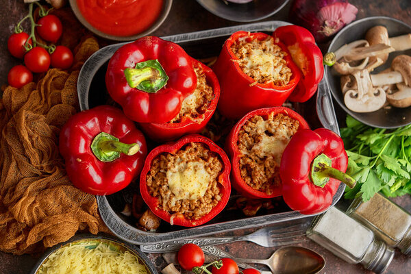 Red peppers stuffed with beef meet and mozarella cheese with herbs and garlic Stock Image