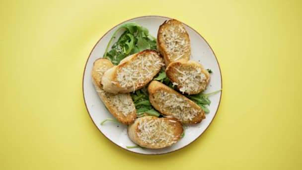Top View Slices Garlic Cheese Bread Served Plate Arugula Leaves — Stock video