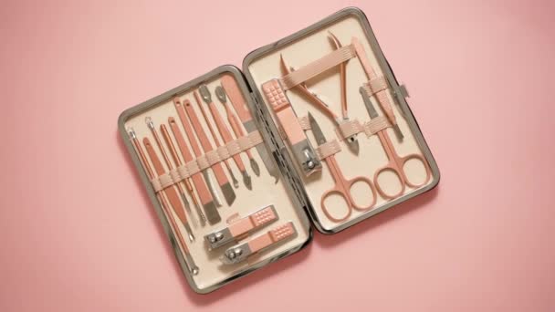Pastel Cosmetic Set Nail Care Case Placed Pink Background Flat — Vídeo de Stock