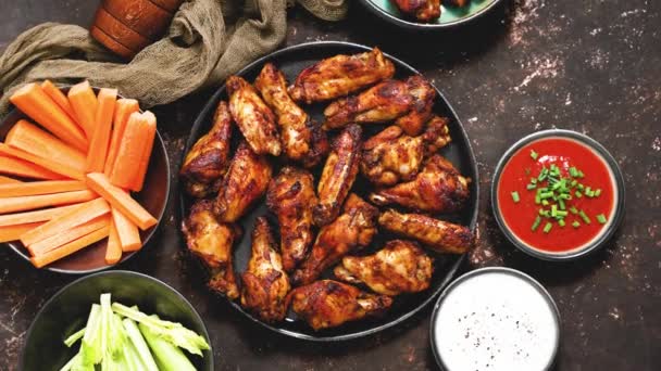 Grilled Spicy Chicken Wings Served Tomato Yogurt Dips Celery Carrot — Stockvideo