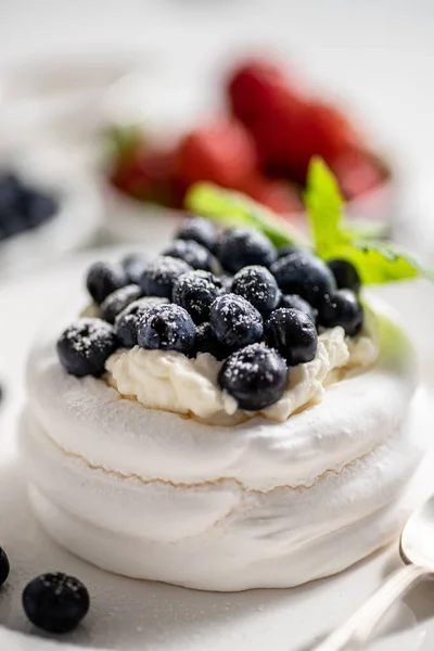 Delicious Mini Pavlova Meringue Nest Blueberry Mint Leaves Served White — Stockfoto