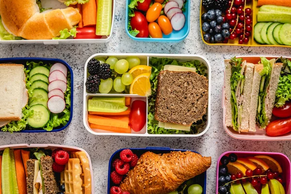 Shot School Lunchboxes Various Healthy Nutritious Meals Stone Background Top — Stockfoto