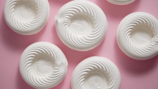 Empty Meringue Nests Placed Pink Background Concept Tasty Sweet Dessert — стоковое видео