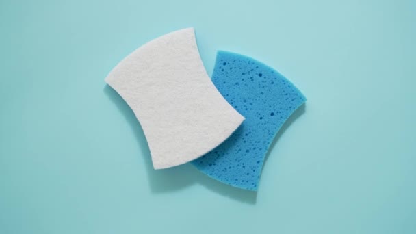 Cleaning Dishwashing Sponges Isolated Blue Background Top View Flat Lay — Stock Video