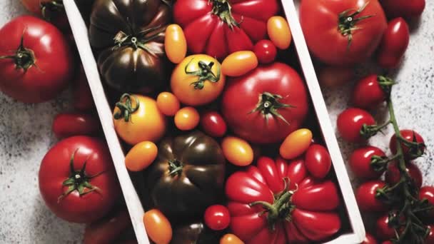 Assortment Tomatoes Wooden Box Fresh Vegetables Placed Stone Background Top — Vídeos de Stock