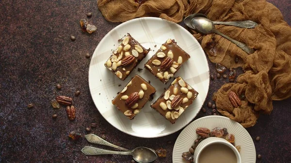 Top View Square Dark Peanut Brownies Nuts Ceramic Saucer Sweets — Zdjęcie stockowe