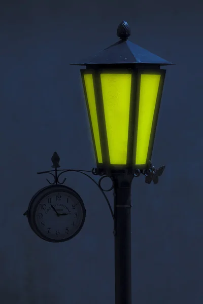 Street lamppost and clocks — Stock Photo, Image