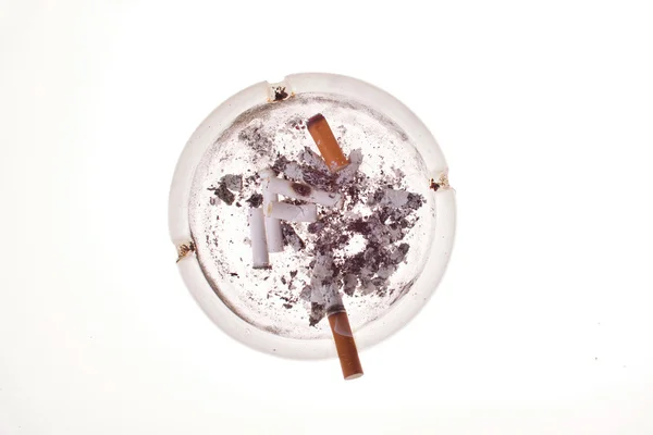 Glass ashtray with stubbed — Stock Photo, Image