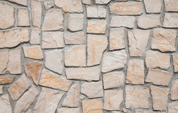 Mauer im alten Stil aus Steinen — Stockfoto