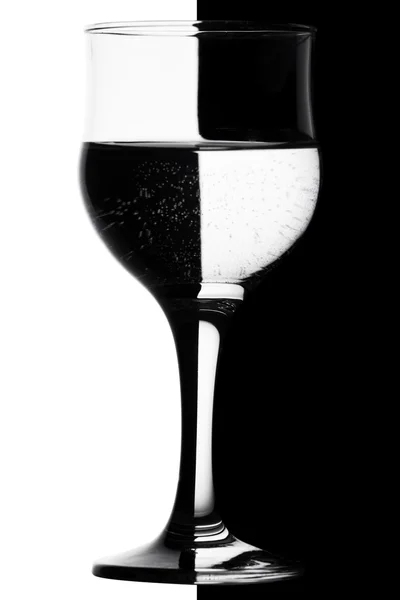 Glass of water on black and white — Stock Photo, Image