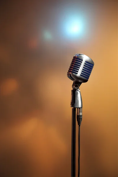 Stylish retro microphone on a colored background — Stock Photo, Image