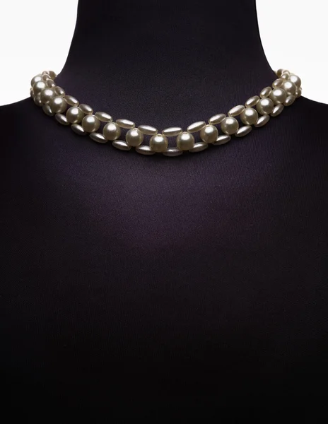 Necklace type pearl on black mannequin isolated on white — Stock Photo, Image