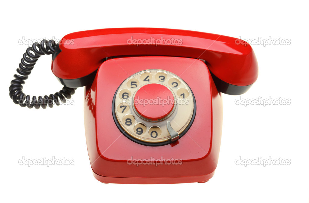 Vintage red phone isolated on a white background