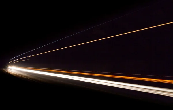 Rutas de luz de coche en el túnel . —  Fotos de Stock