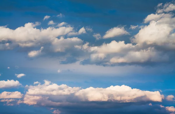 Set of white clouds over blue — Stock Photo, Image