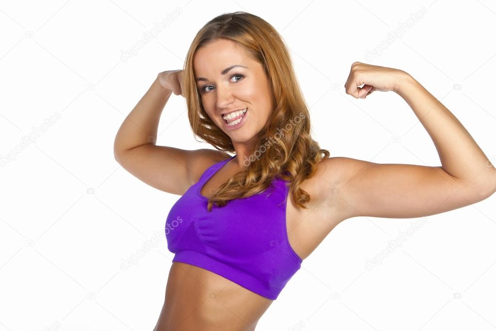 Beautiful young fitness woman. Isolated over white background