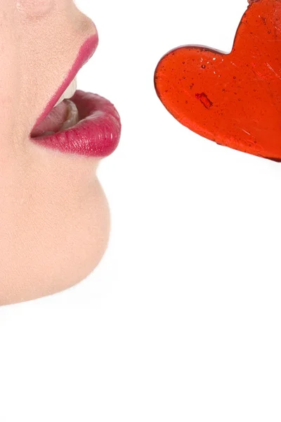 Lábios menina e coração vermelho — Fotografia de Stock