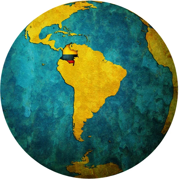 Colombia flag on globe map — Zdjęcie stockowe