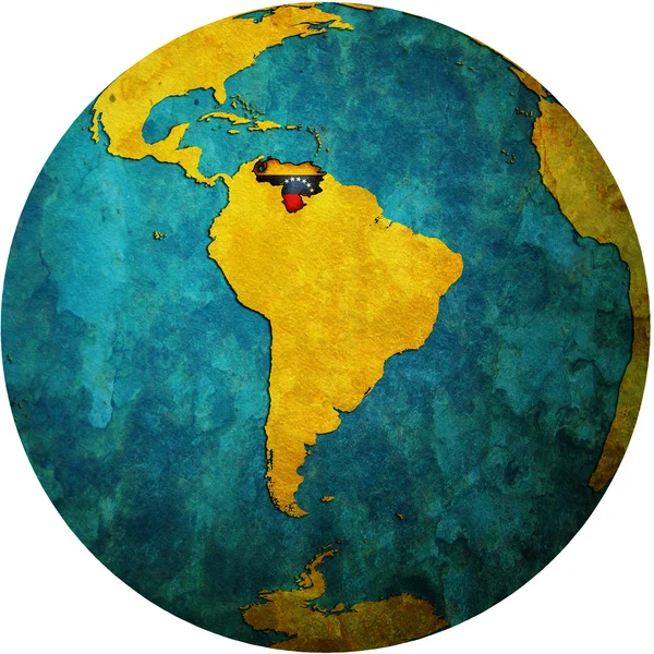 Venezuela flag on globe map — Stock Photo, Image