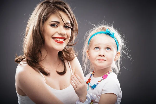 Girl fashion portrait with young mother. — Stockfoto