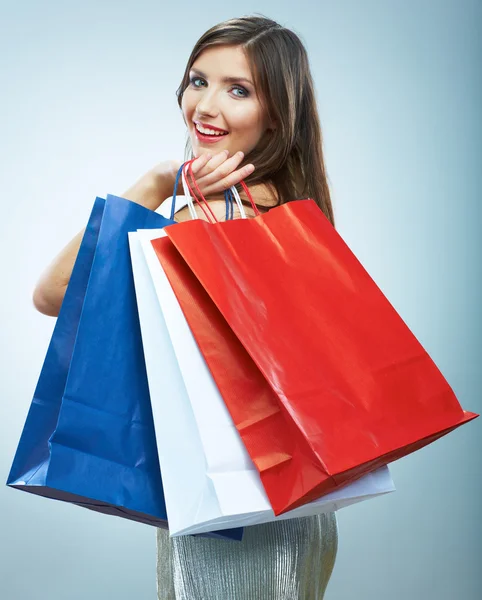 Sorrindo mulher segurando saco de compras . — Fotografia de Stock