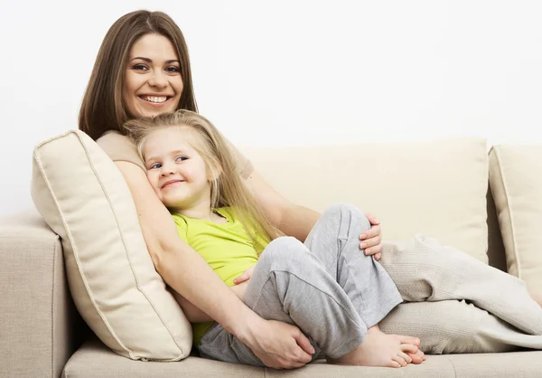 Smiling little girl with mother — Stock Photo, Image