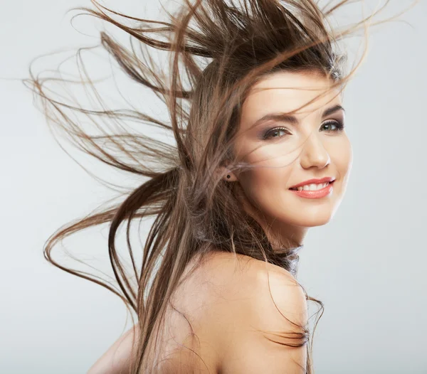 Frauengesicht mit Haarbewegungen — Stockfoto