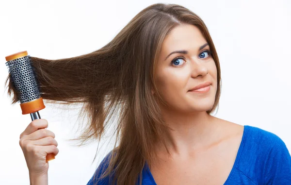 Woman comb long hair — Stock Photo, Image